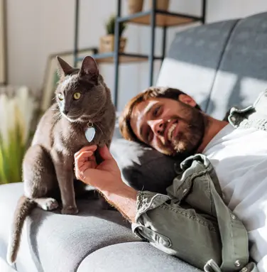 Man napping with cat